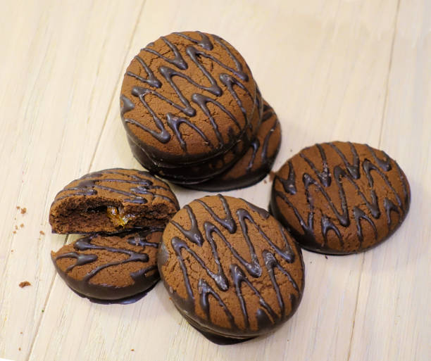 istock Chocolate cookies on a wooden table. Dessert. close-up. 1079769844