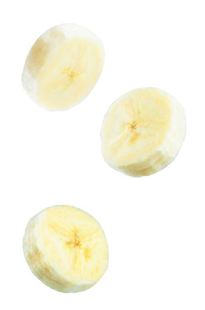 A bunch of ripe bananas is displayed against a rich blue background