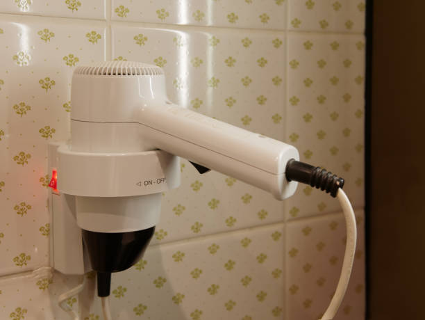 istock hairdryer in the bathroom 1079780124