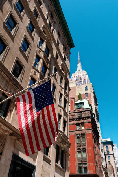 istock american flag on building 1079780208