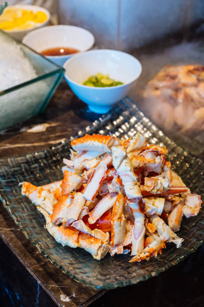 istock Fresh and boiled Alaska king crab legs in buffet line. 1079781744