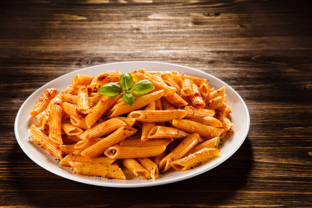 istock Penne, pesto sauce and vegetables 1079782128