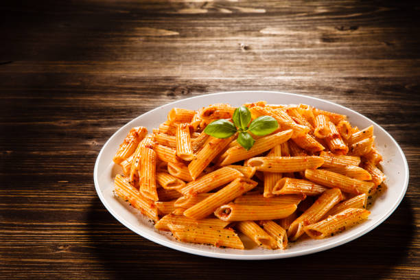 istock Penne, pesto sauce and vegetables 1079782226