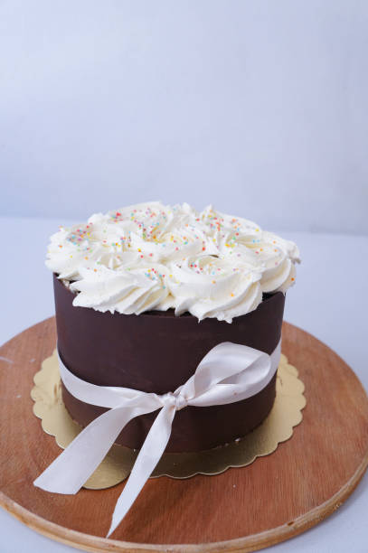 istock Chocolate whole cake with whipped cream 1079783338