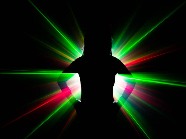 istock silhouette of woman dancing on abstract background 1079785568
