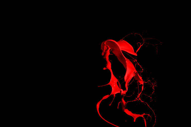 istock Red paint splash isolated on black background. 1079785726