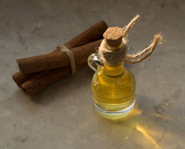 istock Cinnamon Oil in Glass Bottle 1079794430