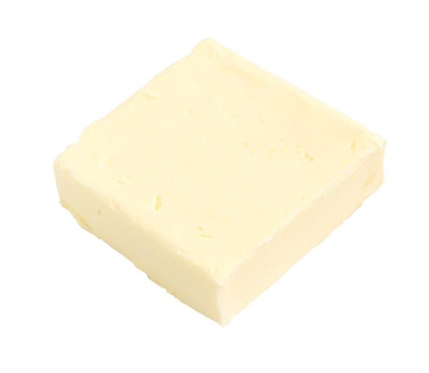 istock Piece Of Butter Isolated On White Background 1079794452