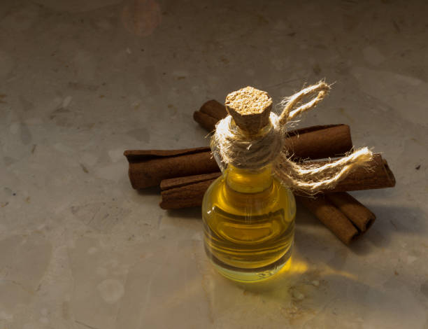 istock Cinnamon Oil in Glass Bottle 1079794454