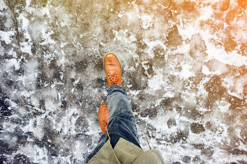 Walk on icy winter pavement background
