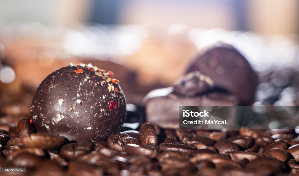 Chocolate pieces and coffee beans close up Chocolate pieces and coffee beans close up background Antioxidant Stock Photo