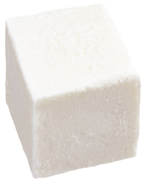 istock Cube of soft cheese isolated on a white background. With clipping path 1079803348