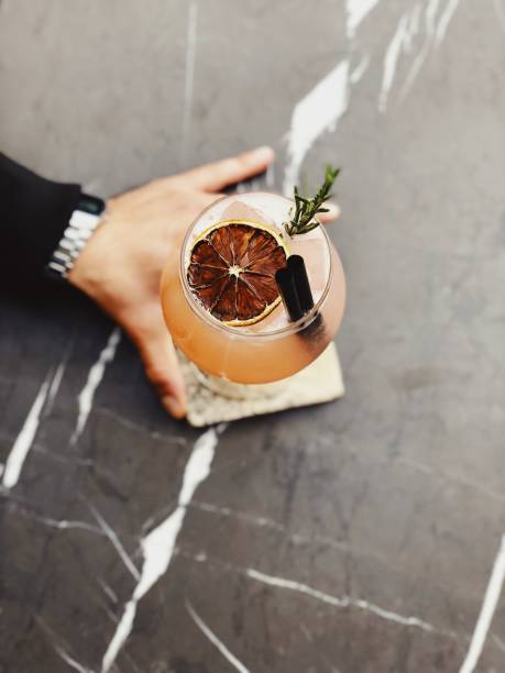 Man holding a cocktail glass