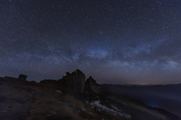 istock Night landscape with bright milky way 1079822284