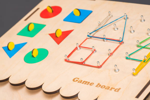 istock The game board with a little toys 1079832950