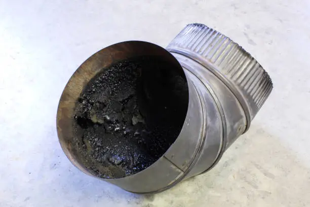 A dangerous buildup of creosote in a stovepipe can cause a chimney fire.