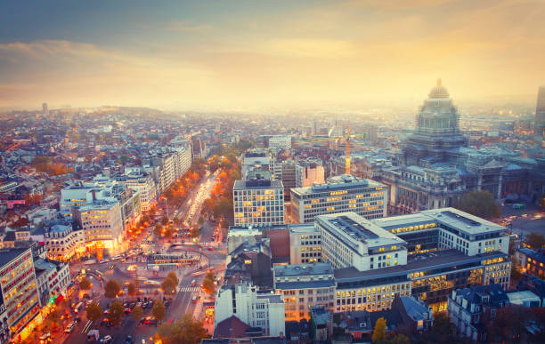 City of Brussels by twilight Aerial view of the City of Brussels with Palace of Justice by twilight brussels capital region stock pictures, royalty-free photos & images
