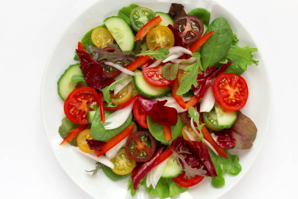 istock Fresh salad with tomato, cucumber, pepper and onion. 1079867912