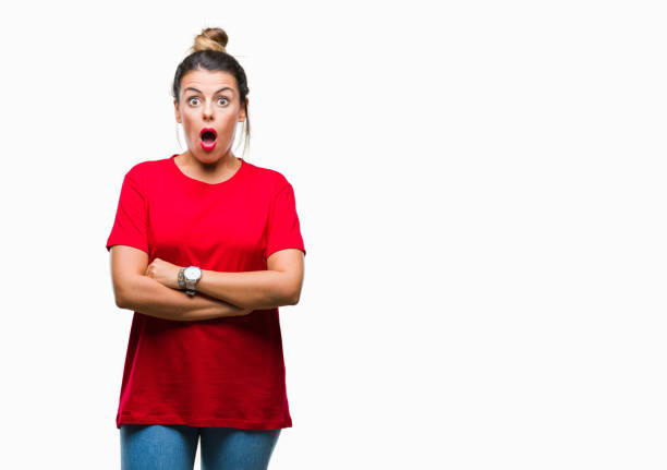 istock Young beautiful woman over isolated background afraid and shocked with surprise expression, fear and excited face. 1079878440