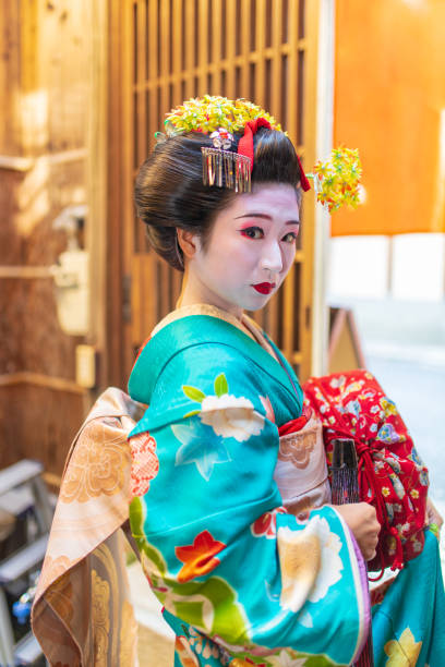 istock It's time for Maiko Apprentice Geisha to visit clients 1079879978