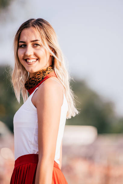 istock Pretty young woman on the beach 1079880984