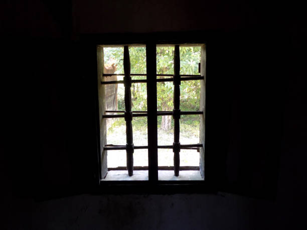 istock View through the old window, from the old room 1079881742