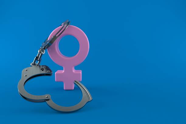 istock Female gender symbol with handcuffs 1079882870