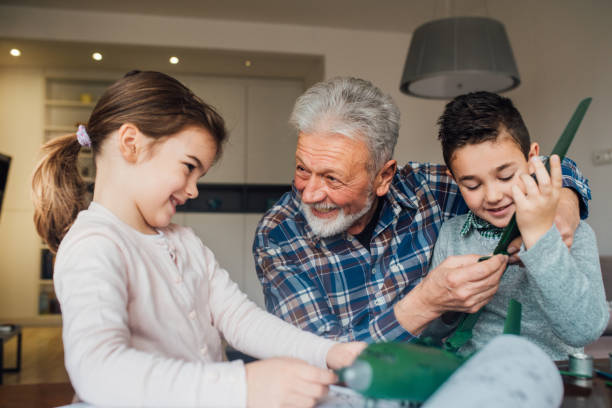 istock Happy family doing crafts 1079886070