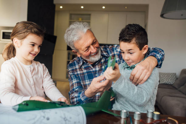 istock Family crafting a toy 1079886080