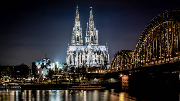 istock Cologne Cathedral and Hohenzollern Bridge at night 1079899850