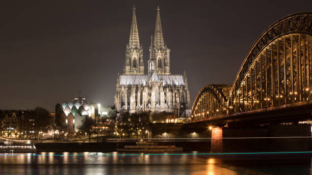 istock Cologne Cathedral and Hohenzollern Bridge at night 1079900024