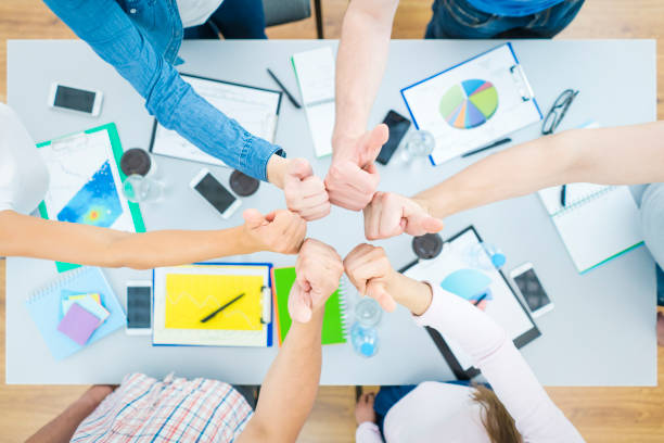 istock The students thumb up at the table. view from above 1079900728