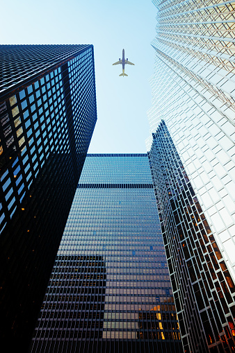 Passenger jet on final approach to a city airport.