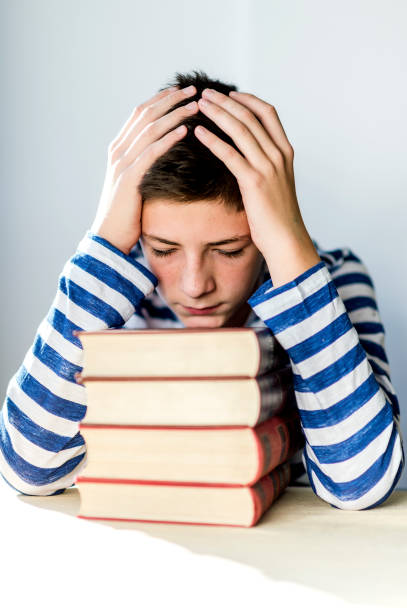 istock Teen and homework 1079917604
