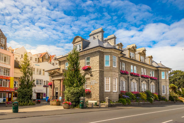 The Guernsey Information Centre buiding at the St Peter port in Guernsey. St Peter Port, Guernsey - July 17th, 2018: The Guernsey Information Centre building at the St Peter port in Guernsey. guernsey city stock pictures, royalty-free photos & images