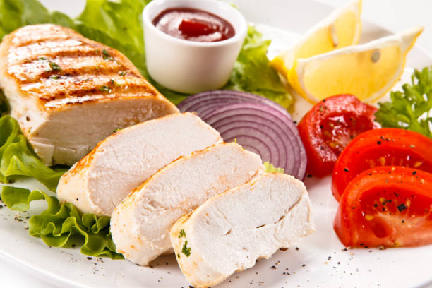 istock Roast chicken fillets and vegetables 1079932600