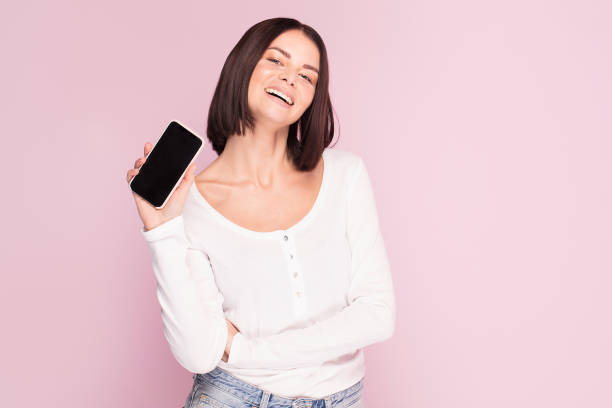 istock Beautiful woman with mobile phone, emotions. 1079932910