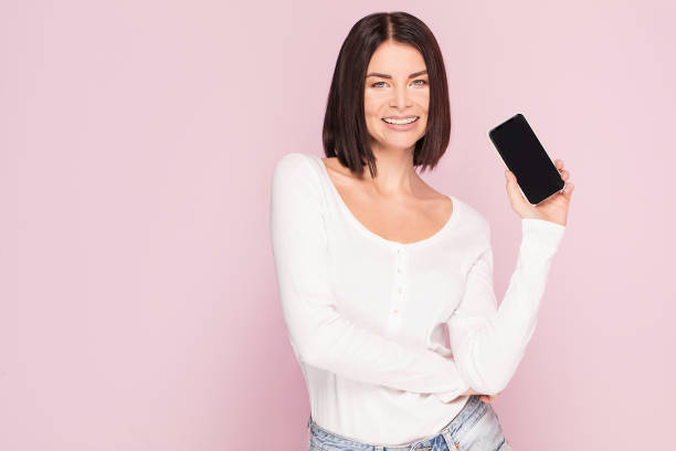 istock Beautiful woman with mobile phone, emotions. 1079932982