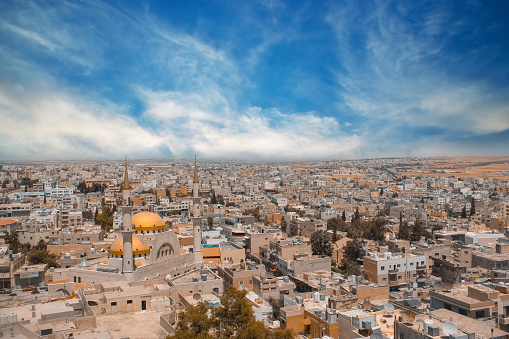 wide shot view over the town center of Madaba in Jordan with the Central Mosque. Landscape of Jordan