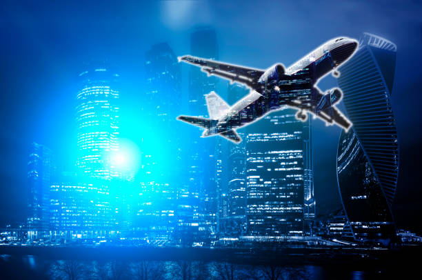 istock Double exposures modern office skyscrapers cities at night with airplane take off 1079949956