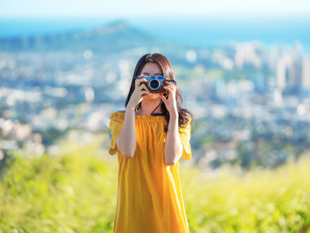 a young girl traveler taking photos on tourist viewpoint - girl5 imagens e fotografias de stock