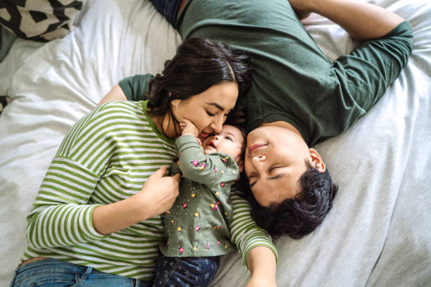 istock Toddler and her parents 1079962490