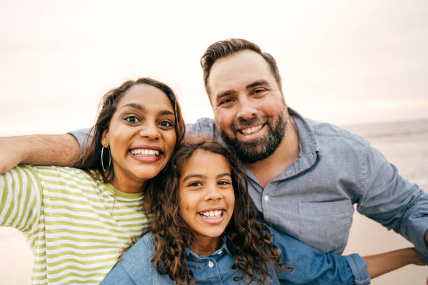 istock Family with one daughter looking to the camera 1079962704