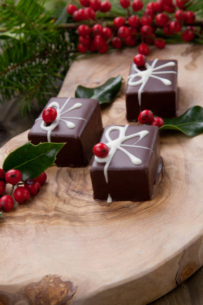 istock Christmas Chocolate Candy and Red Berries 1079963118