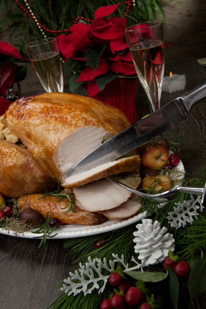 istock Carving Roasted Christmas Turkey with Grab Apples 1079963302