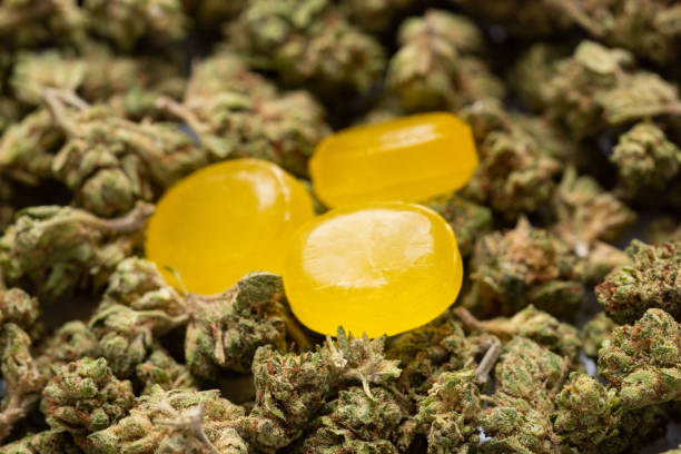 Organic Cannabis Candies Organic Cannabis Candies full frame bud candy stock pictures, royalty-free photos & images