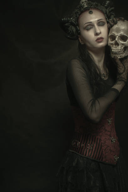 istock Horned lady with skull 1079970248
