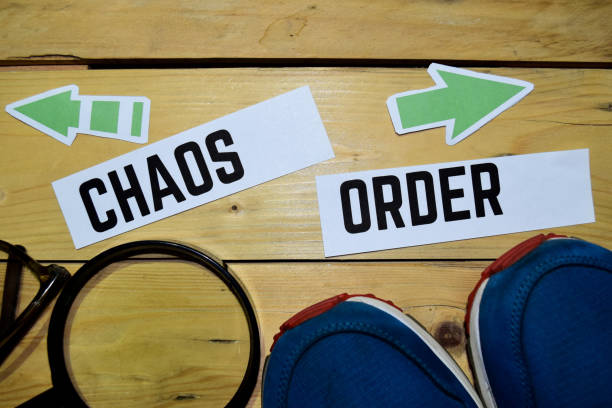 istock Chaos or Order opposite direction signs 1079975748
