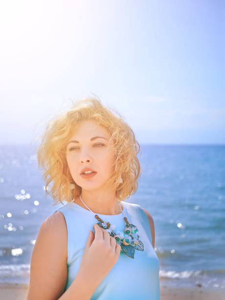 istock Woman on the beach 1079997012