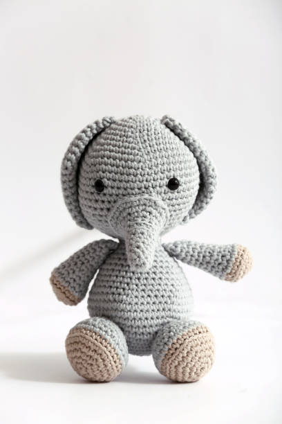 istock Soft knitted toy and on white background. 1079999986